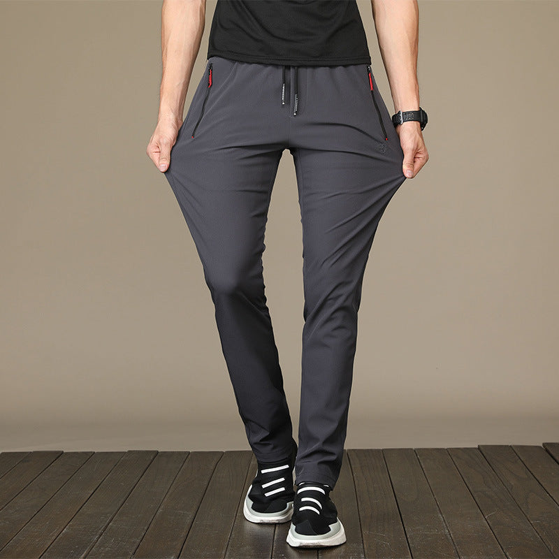autumn and winter men's casual pants young Korean version of the Korean version of the body and small feet pants student movement pencil pants tide