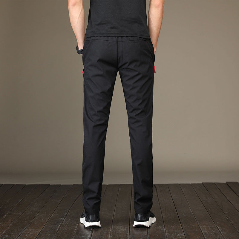 autumn and winter men's casual pants young Korean version of the Korean version of the body and small feet pants student movement pencil pants tide