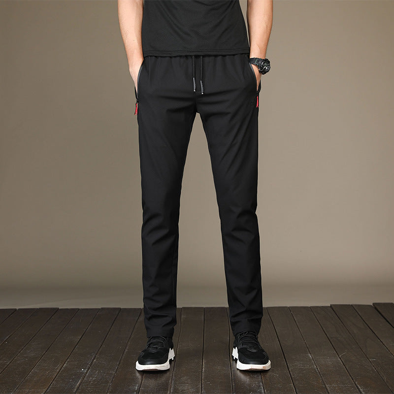 autumn and winter men's casual pants young Korean version of the Korean version of the body and small feet pants student movement pencil pants tide