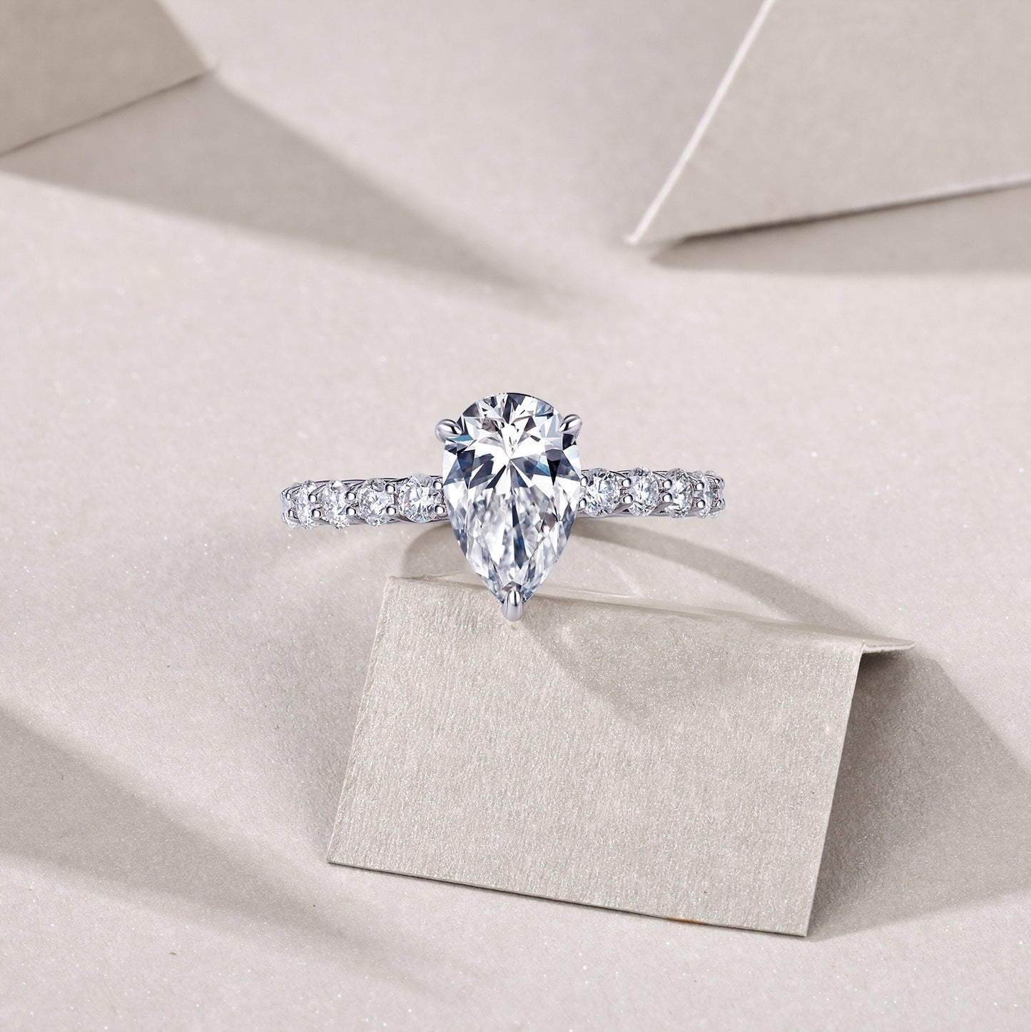 Moonlight Water Drop - A Wedding Ring Set With Top-quality Pear-shaped Moissanite S925 In Silver And Platinum-plated. The Ring Can Be Inspected With A Diamond Pen